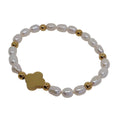 Pulsera elastica perlas con flor de 4 hojas