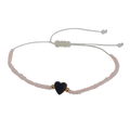 Pulsera regulable con mostacillas rosada con corazón