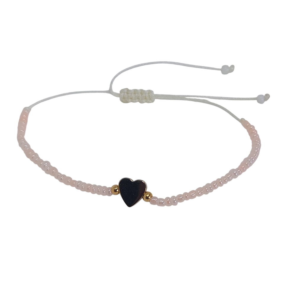 Pulsera regulable con mostacillas rosada con corazón